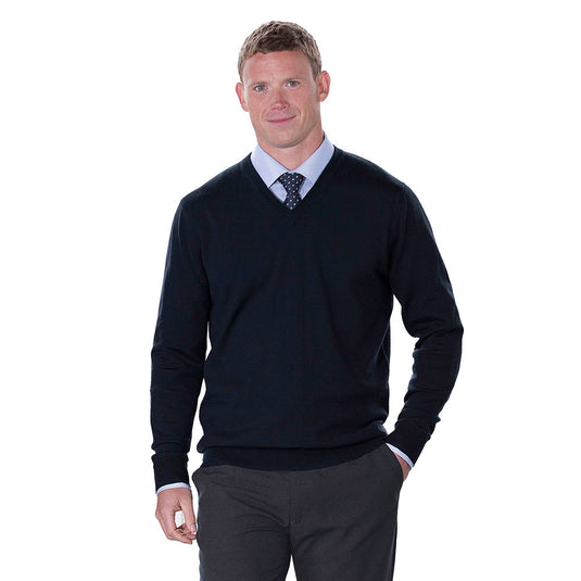 Merino Mens Detailed Vee Pullover shown on a man, featuring a single jersey vee neck binding and 1x1 rib cuffs, crafted from 100% New Zealand merino wool, ideal for workplace settings.