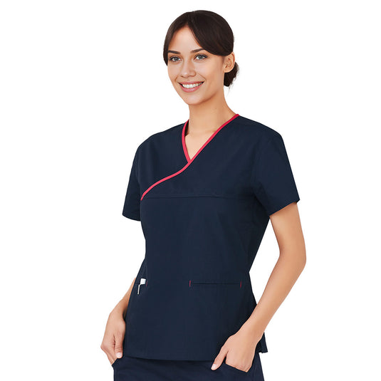 Biz Womens Contrast Scrub Top featuring a stylish crossover design with contrast trim and two front welt pockets. Crafted from durable, high-performance fabric, ensuring comfort, easy movement, and hygienic washability up to 80°C.