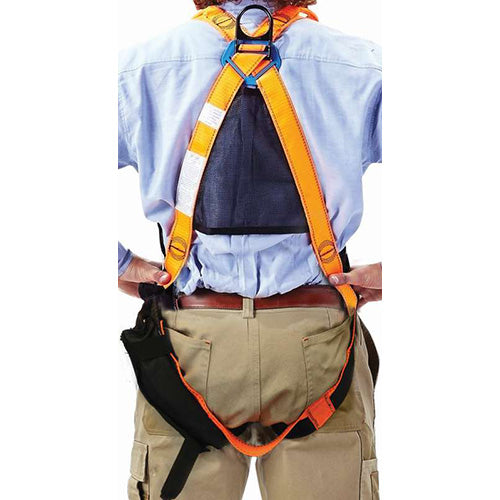 LINQ Tactician Rigger Harness worn by a person, featuring a secure fit with a unique suspension trauma strap, designed for maximum safety and comfort during high-altitude work.