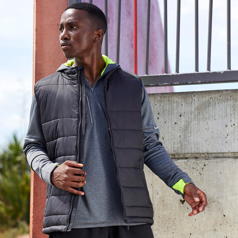 Load image into Gallery viewer, Biz Mens Alpine Vest: A hip-length eco-puffer vest with a stand-up wind collar, ergonomic zip pockets, and a non-quilted yoke, featuring sustainable recycled PET insulation and a showerproof nylon shell.