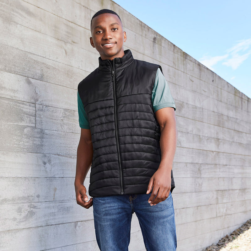 Load image into Gallery viewer, Biz Mens Expedition Vest with ultra-light rip-stop fabric and premium hi-loft insulation, featuring a high collar, chin guard, zippered pockets, and embroidery access, ideal for safety and workwear needs.
