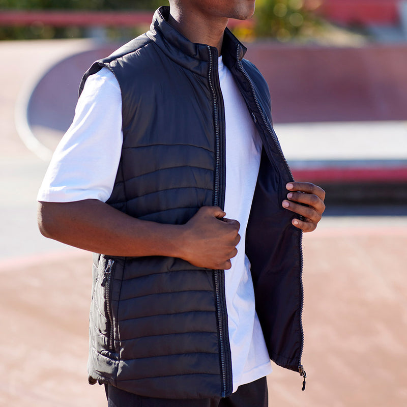 Load image into Gallery viewer, Biz Mens Expedition Vest, a lightweight, ultra-durable vest featuring a high collar and chin guard, made from water-repellent nylon ripstop, offering premium warmth with hi-loft polyfil insulation and convenient zippered pockets.