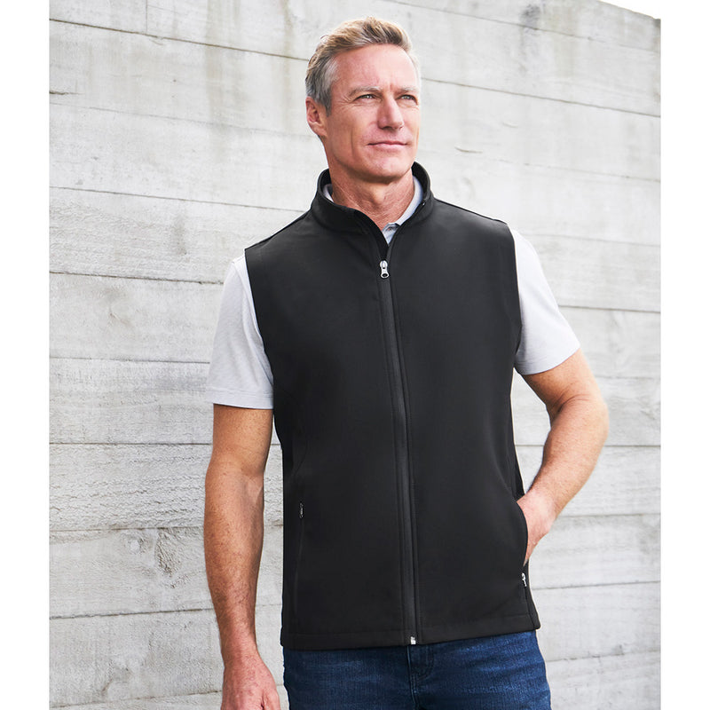 Load image into Gallery viewer, Biz Mens Apex Vest worn by a man, featuring a stand-up collar and scalloped back for added warmth, designed with water-repellent and wind-resistant polyester, perfect for active safety needs.