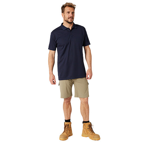 Man wears Jet-Lite Utility Shorts, showcasing their durability and functionality. Ideal for workwear, these shorts feature reinforced pockets and a straight-fit design, embodying Active Safety's commitment to quality workplace supplies.