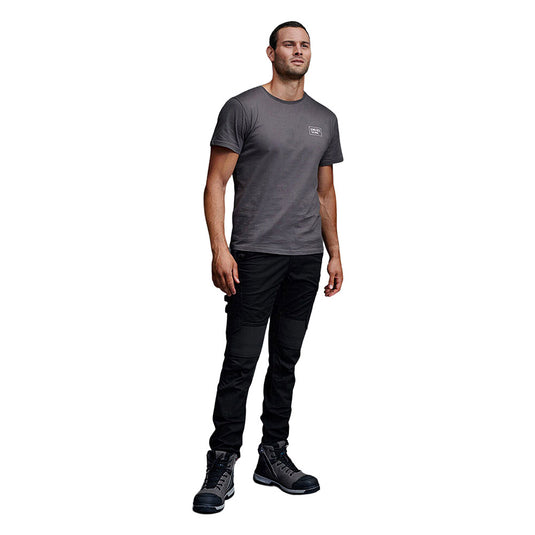 KingGee Quantum Lightweight Stretch Ripstop Pants, Black, showcased by a male model, feature slim-fit cargo style with multifunctional pockets and knee pad areas, designed for comfort and durability in demanding work environments.