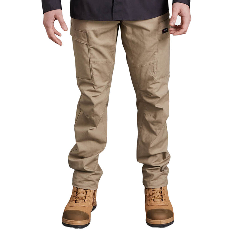 Load image into Gallery viewer, King Gee Workcool Ripstop Pro Pant showcased on a person, highlighting its stretch ripstop fabric and multifunctional pockets, ideal for durability and comfort in active safety work environments.