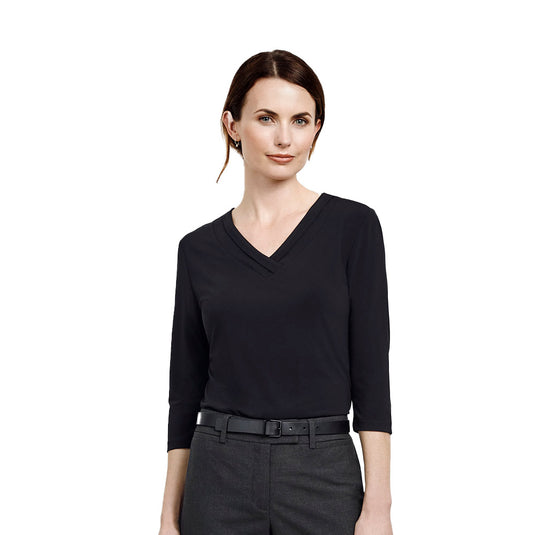 Biz Ladies Lana 3/4 Sleeve Top showcases a pleat fold V-neck, ideal for modern working women. The jersey knit drapes elegantly, offering a flattering fit suitable for workplace attire.