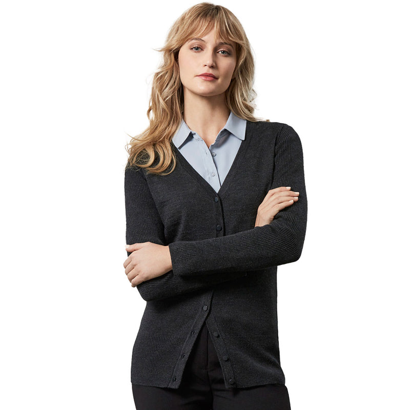 Load image into Gallery viewer, Biz Womens Milano Cardigan on a woman with arms crossed, showcasing its longline design and ribbed sleeve detail, ideal for versatile layering with durable, pill-resistant merino wool blend.