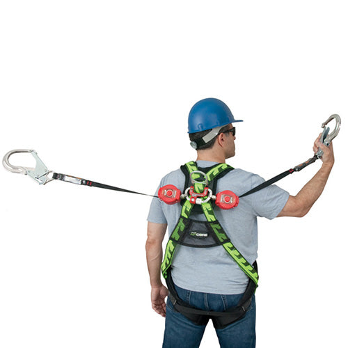Turbolite G2 Connector Bracket in use, worn by a man with a safety harness and helmet, showcasing its secure attachment and swivel functionality for enhanced mobility at height.