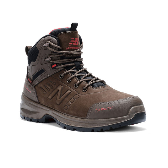 New Balance Calibre Zip Sided 2E Safety Boot, Chocolate, showcases a rugged design with a composite toe, slip-resistant outsole, and a convenient YKK zipper, ideal for demanding work environments.
