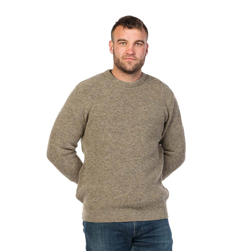 Load image into Gallery viewer, MKM Backyard Wool Jersey: A bearded man wears this classic crewneck sweater, perfect for layering. Made from 100% New Zealand wool, it offers durability and warmth for outdoor workwear.