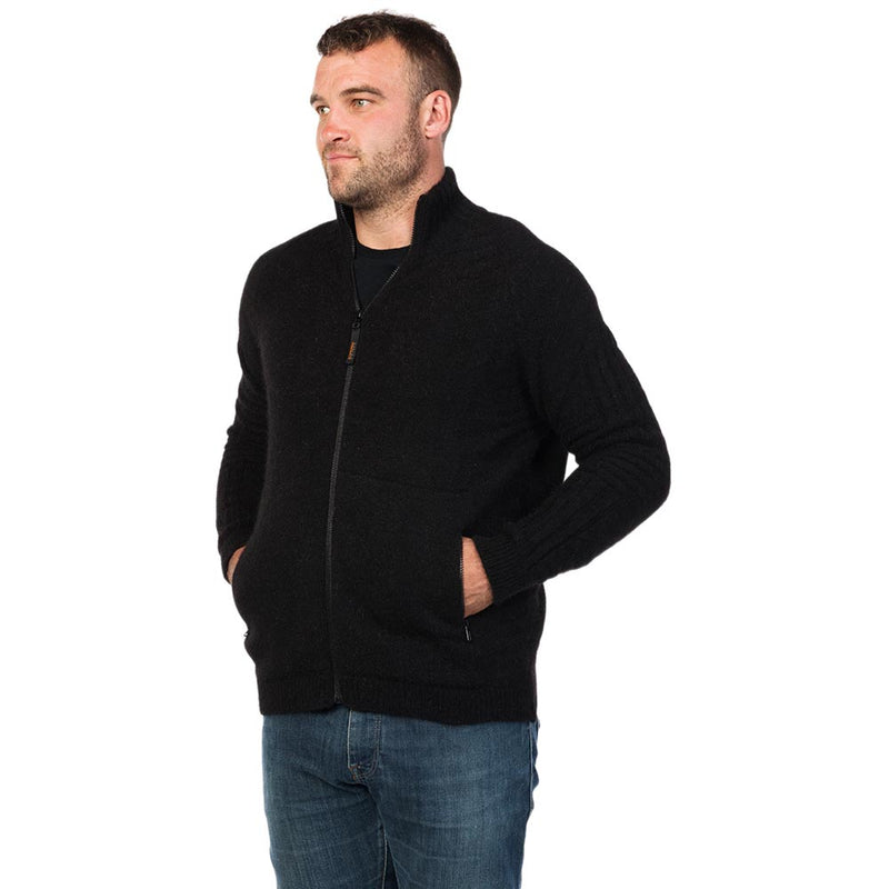 Load image into Gallery viewer, MKM Rural Full Zip Jacket in Eco Blend, featuring ribbed collar, cuffs, hem, and side detailing, with front pockets, modeled with blue jeans. Made in New Zealand from sustainable materials.