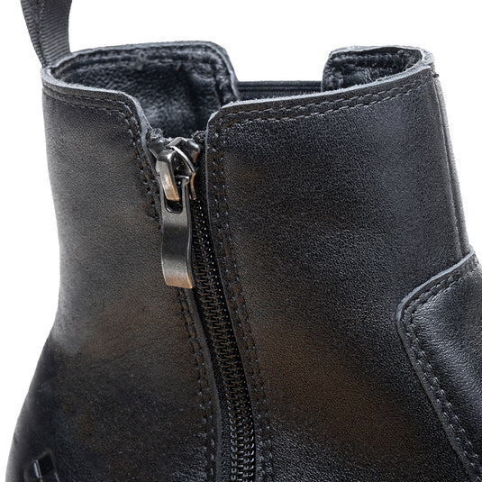 Apex Nancy Safety Boots with fine leather upper, steel safety toe, elasticated side, YKK zip, slip-resistant sole, and PU outsole designed for comfort and durability, ideal for workplace safety.