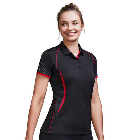 Biz Ladies Razor Polo Shirt featuring an interlock knit for stretch, grid mesh underarms for ventilation, unique sleeve print, and contrast panels—ideal for active comfort and workplace settings.