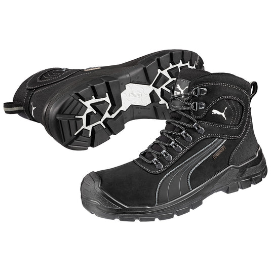 Puma Sierra Nevada Zip Sided Safety Boot features waterproof waxed leather, a fibreglass toe cap, and a scuff-resistant toe, designed for high-risk environments and optimal comfort.
