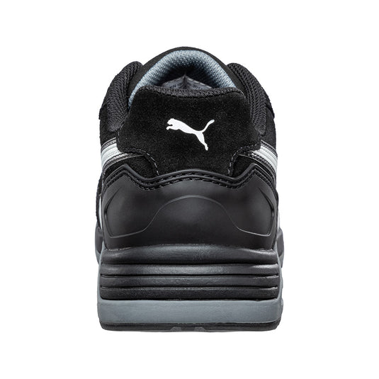 The Puma Airtwist Safety Shoe, Black/White, showcases a sleek suede leather upper with reflective elements, breathable lining, and a durable, heat-resistant sole, ideal for safety and comfort in demanding workplaces.