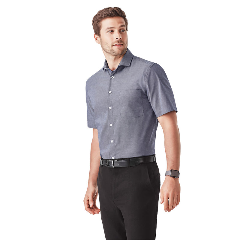 Load image into Gallery viewer, Biz Charlie Classic Fit S/S Shirt featuring a smart-casual design with a chest pocket, buttoned front, and short sleeves, ideal for workplace environments.