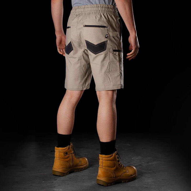 Load image into Gallery viewer, BAD Saviour Elastic Waist Work Shorts, featuring a comfortable elastic waistband, adjustable drawstring, and reinforced pockets, paired with durable brown boots. Ideal for active work environments requiring safety and functionality.