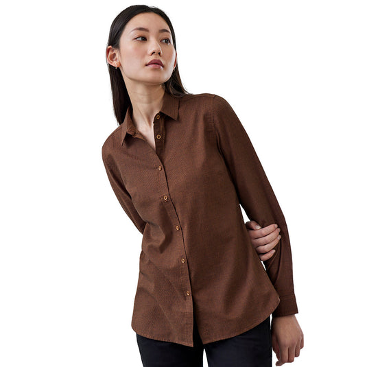 Biz Womens Soul Long Sleeve Shirt features a relaxed fit with a button-down collar, adjustable cuffs, and a curved hem. Ideal for workplace comfort with its soft, garment-washed texture.