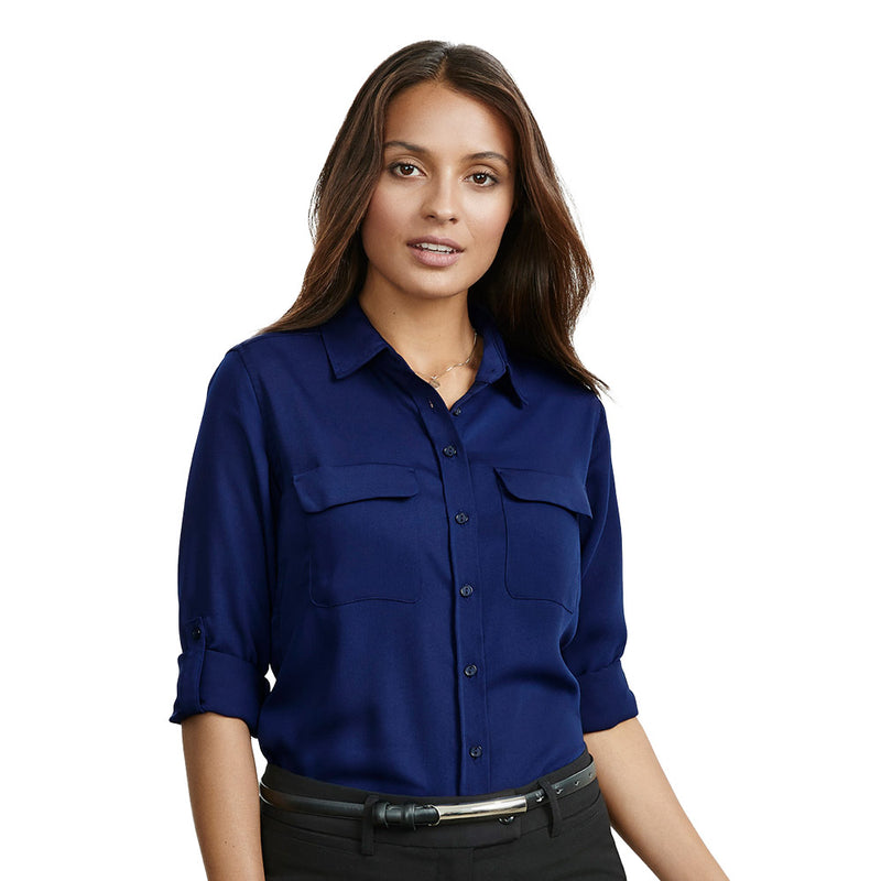 Load image into Gallery viewer, Biz Ladies Madison Long Sleeve shirt worn by a woman, featuring a comfortable fit with roll-up sleeves, a collar, and an action-back pleat, ideal for both office and casual settings.