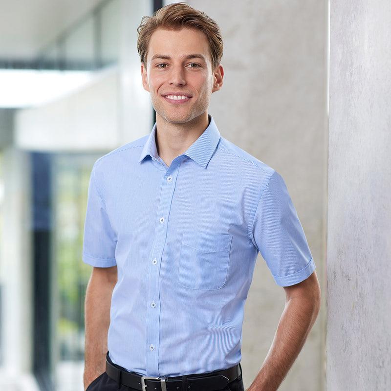 Load image into Gallery viewer, Biz Mens Euro Short Sleeve Shirt shown on a man, highlighting the modern collar and chest pocket, ideal for professional settings. The shirt's easy-care fabric offers both style and practicality.