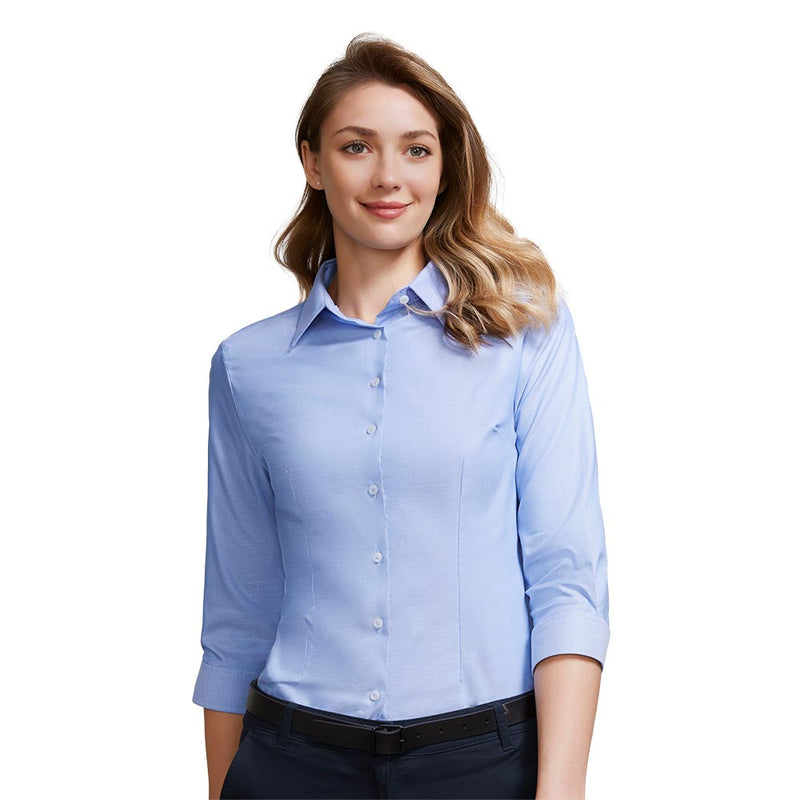 Load image into Gallery viewer, Biz Womens Regent 3/4 Sleeve Shirt, featuring a light blue button-front design with three-quarter sleeves, tucked into dark trousers. The shirt offers a modern, professional look perfect for workplace settings.