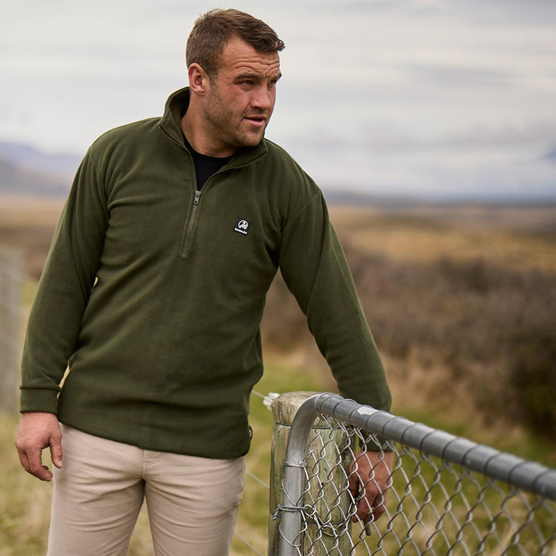 Load image into Gallery viewer, Swanndri Motu Fleece Pullover, a mid-weight anti-pill polar fleece with a quarter zip and brand patch on the chest, ideal for layering in active safety environments.