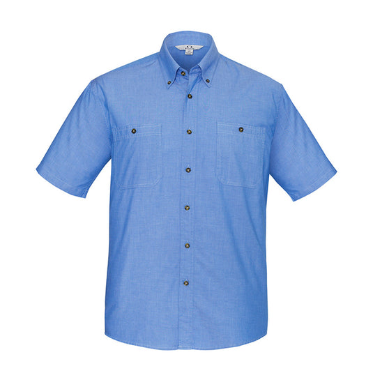 Biz Chambray Short Sleeve Shirt with button-down collar and tortoise shell buttons, featuring chest pockets and twin-needle stitching. Ideal workwear from Active Safety, showcasing traditional fit and wrinkle-resistant fabric.