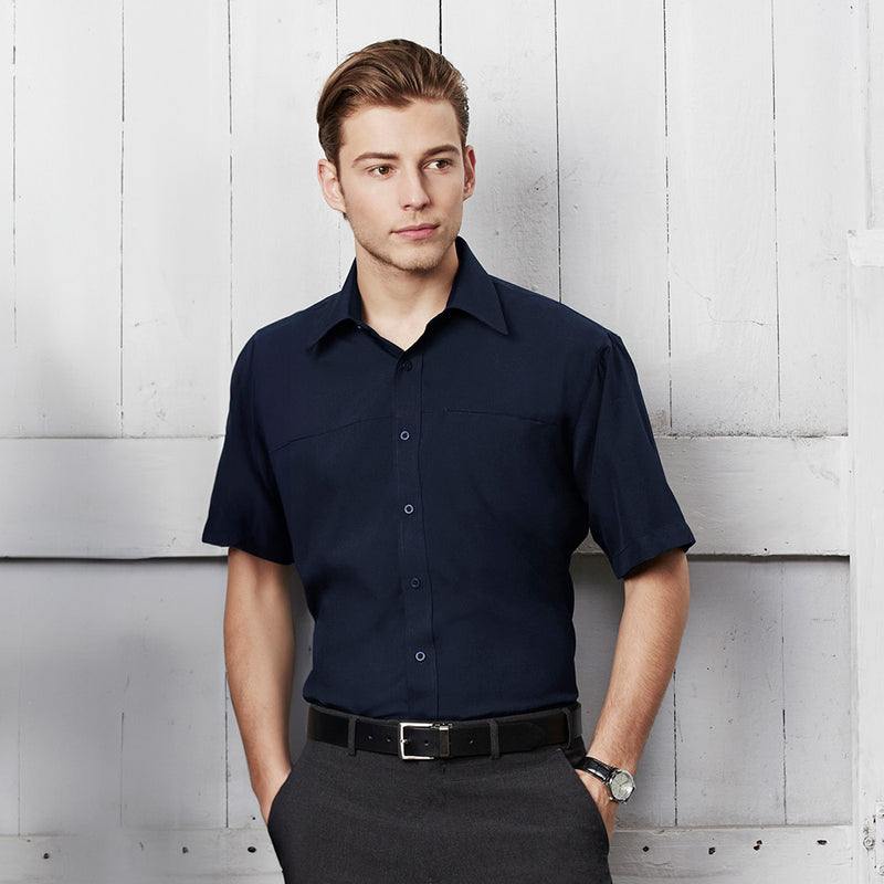 Load image into Gallery viewer, Biz Mens Oasis Short Sleeve Shirt in breathable BIZ COMFORTCOOL™ fabric, featuring a standard collar, jet chest and pen pocket, and a curved hem, ideal for workplace comfort and style.