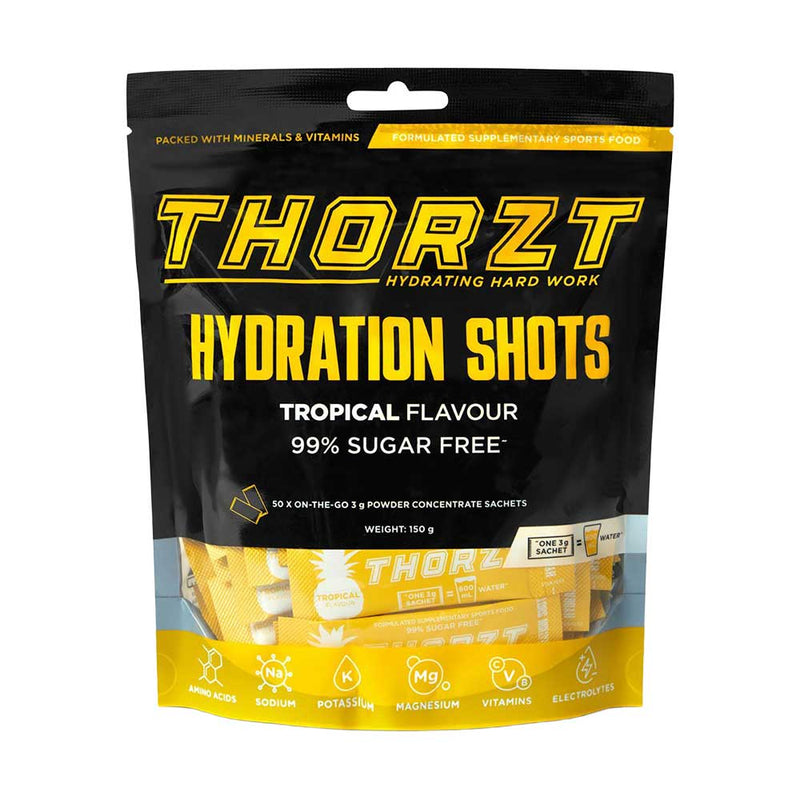 Load image into Gallery viewer, Thorzt Solo Shot Sachet, Tropical: Pack/50, featuring a bag with yellow packets designed for hydration. The packaging highlights a blend of electrolytes and vitamins, ideal for enhancing physical and mental performance.