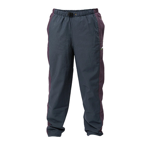 Stormforce Ladies Overtrousers featuring 500D ripstop fabric, elastic waistband, and reinforced hip pockets, providing 100% waterproof and breathable protection, ideal for pairing with outdoor safety gear.