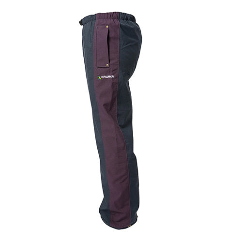 Load image into Gallery viewer, Stormforce Ladies Overtrousers featuring a close-up of the trousers showcasing a pocket. These waterproof pants are designed for comfort, with reinforced pockets and a cut-away heel for safety.