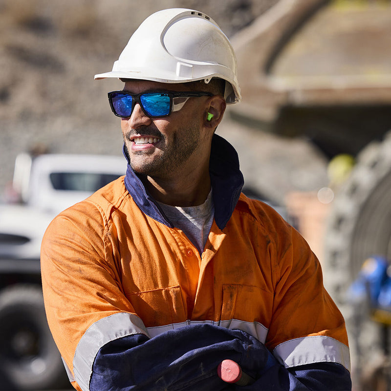 Load image into Gallery viewer, Bolle STKS 420 Safety Glasses: Black/Cobalt Mirror Polarised; eco-friendly design with integrated clear side-shields, offering premium anti-scratch and anti-fog features, ideal for outdoor work and enhancing visual comfort.