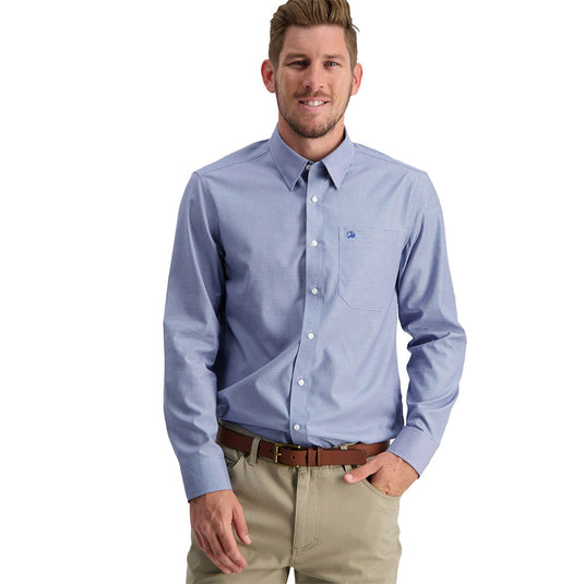 Swanndri Mens Barrington Long Sleeve Shirt showcased on a smiling man, highlighting its classic fit, single chest pocket with embroidered swan logo, and hidden button-down collar, ideal for business or semi-formal settings.