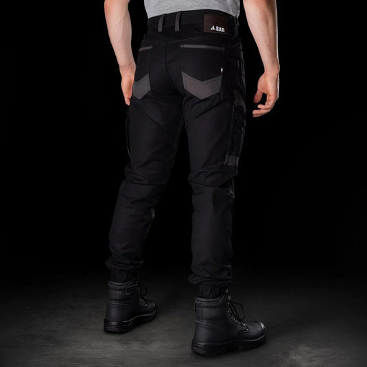 BAD Attitude Slim Fit Cuffed Work Pants showcased with reinforced pockets and knees, featuring a belt loop waist and comfort elastic sides, ideal for active work environments.