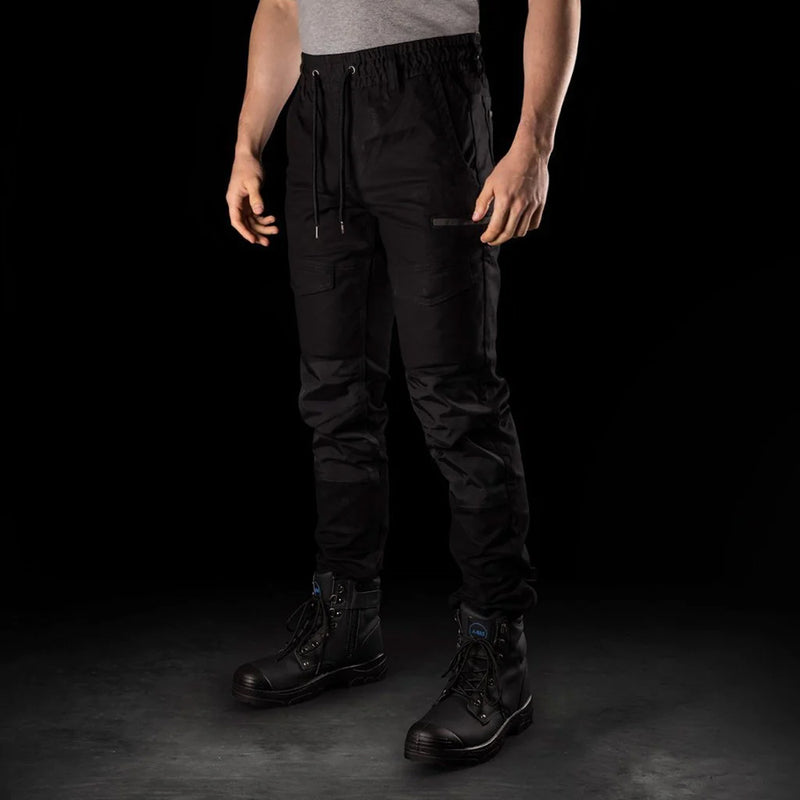 Load image into Gallery viewer, BAD Saviour Cuffed Elastic Waist Work Pants showcased worn with black boots, highlighting their slim fit, adjustable drawstring, reinforced knees, and functional pockets, ideal for safety and workplace use.