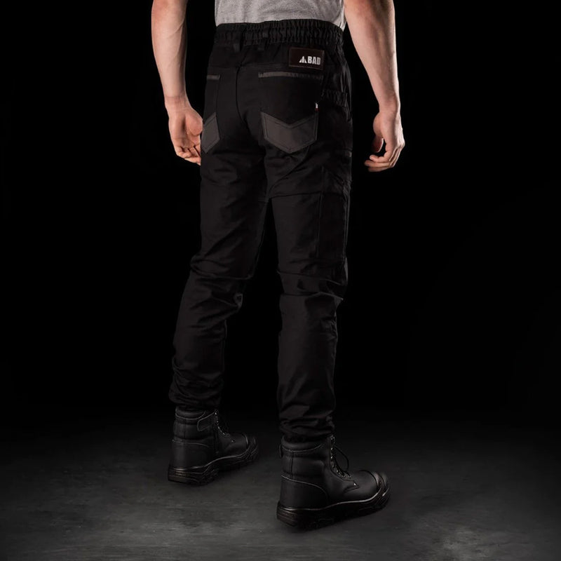 Load image into Gallery viewer, BAD Saviour Cuffed Elastic Waist Work Pants highlighted, showcasing slim fit with cuffed ankles, reinforced pockets, and practical features such as a smartphone pocket with Velcro closure, ideal for workplace safety.
