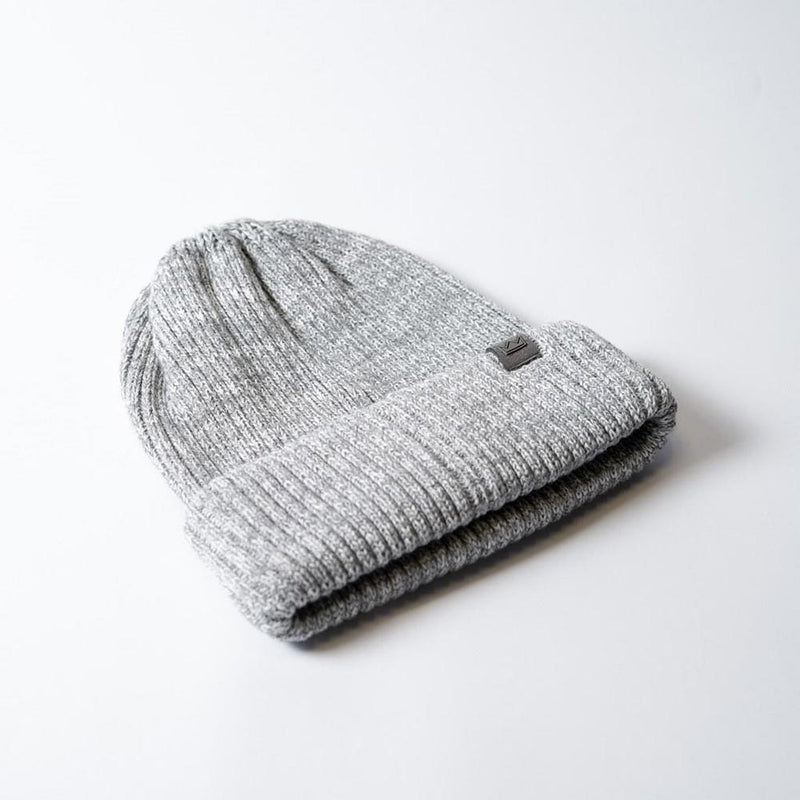 Load image into Gallery viewer, UFlex Fishermans Beanie, a rib-knit winter hat with a cuffed hem, crafted from a blend of viscose, nylon, and polyester, laid flat, ideal for workplace warmth from Active Safety.