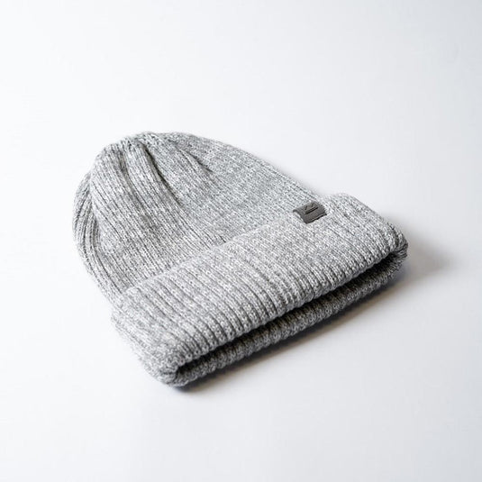 UFlex Fishermans Beanie, a rib-knit winter hat with a cuffed hem, crafted from a blend of viscose, nylon, and polyester, laid flat, ideal for workplace warmth from Active Safety.