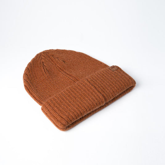 UFlex Fishermans Beanie, a fold-up cuff knit design, showcases ribbed texture and cuffed hem, crafted from a viscose, nylon, and polyester blend, ideal for versatile, everyday wear.