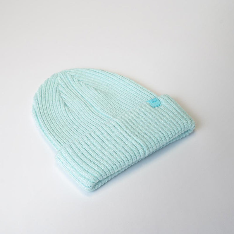 Load image into Gallery viewer, UFlex Fishermans Beanie, a ribbed knit winter hat with a folded cuff, is displayed flat. Crafted from a viscose, nylon, and polyester blend, it offers warmth and flexibility, suited for various safety gear needs.