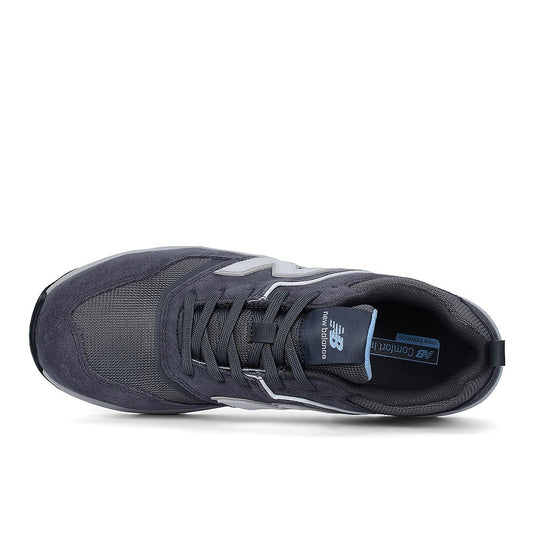 New Balance Elite Lite Womens Safety Shoe, Magnet/Whispy Blue, top-down view showing navy mesh and suede upper with contrasting N logo, cushioning, composite toe, and slip-resistant outsole for safety and comfort.