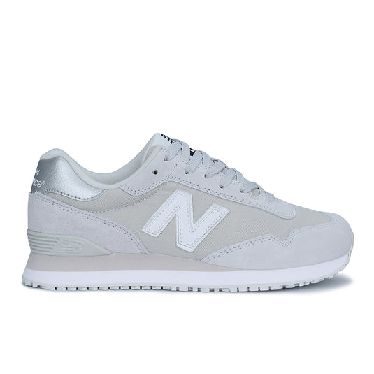 New Balance 515 SR Women's Non-Safety Shoe, Grey, featuring a close-up view highlighting its lightweight design, slip-resistant rubber outsole, and reinforced suede leather, ideal for long work shifts.