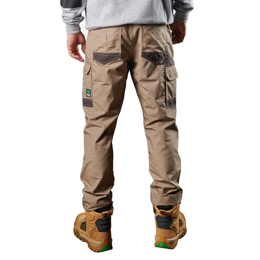 FXD WP-5 Stretch Work Pants, showcasing a rear view with flap thigh and seat pockets, paired with matching work boots. Designed for durability and flexibility, ideal for active safety and workplace environments.