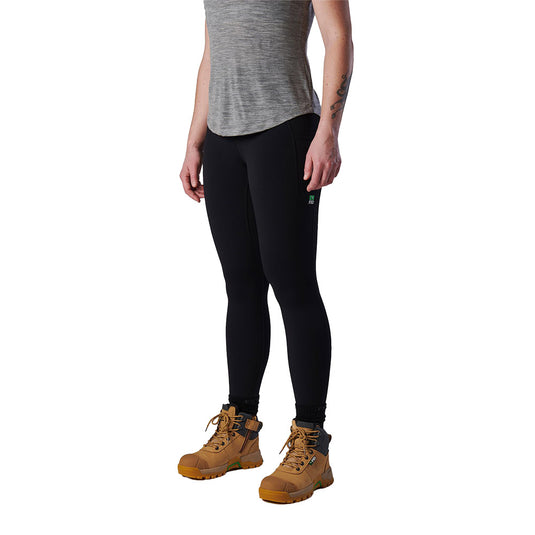 FXD WP-9W Womens Leggings showcased on a model, emphasizing their fit and comfort. These 4-way stretch work leggings feature side pockets and a high-rise waistband, suitable for active workplaces.