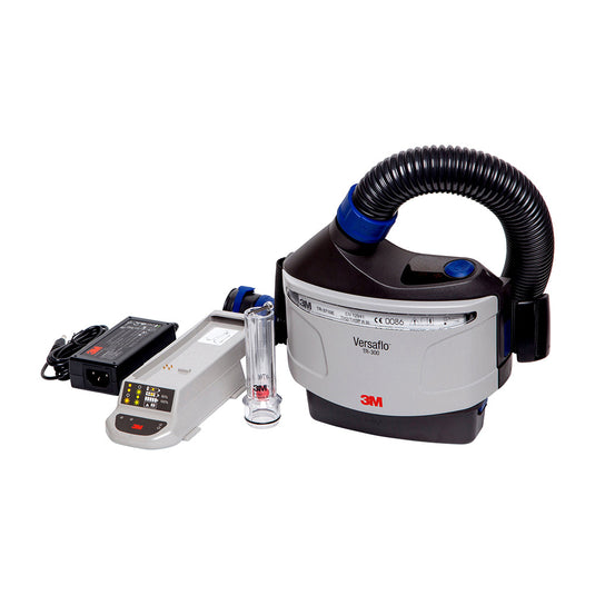3M TR-300 Versaflo Powered Air Purifying Respirator kit featuring a vacuum-like breathing tube and battery components for effective particulate protection in dust environments, ideal for safety and workplace applications.