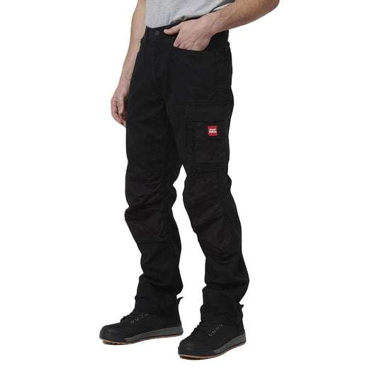 Hard Yakka Legends Cargo Pants with multiple pockets and Cordura reinforcement on knees, modeled with black work shoes and a gray T-shirt hem, ideal for durability and comfort in work settings.