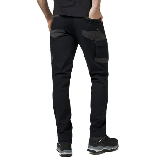 Hard Yakka 3056 Raptor Comfort Fit Work Pant, designed for durability and comfort, features reinforced abrasion zones, utility pockets, and reflective logos, ideal for both worksite and casual settings.