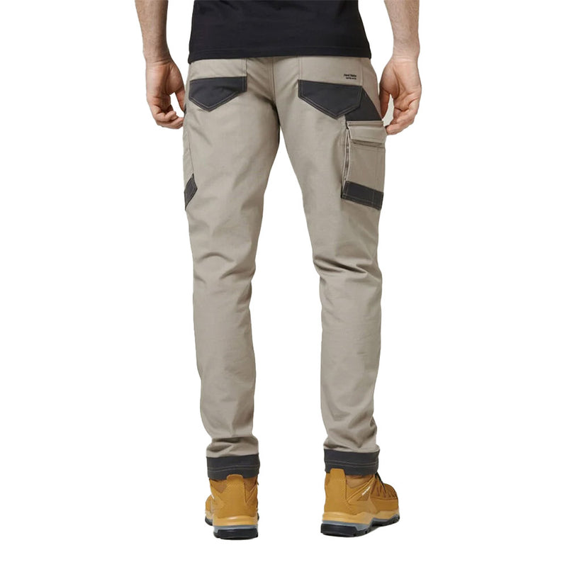 Load image into Gallery viewer, Hard Yakka 3056 Raptor Comfort Fit Work Pant, designed for durability and comfort, features reinforced zones, multiple pockets, and reflective logos, ideal for active safety environments and eco-conscious workwear.