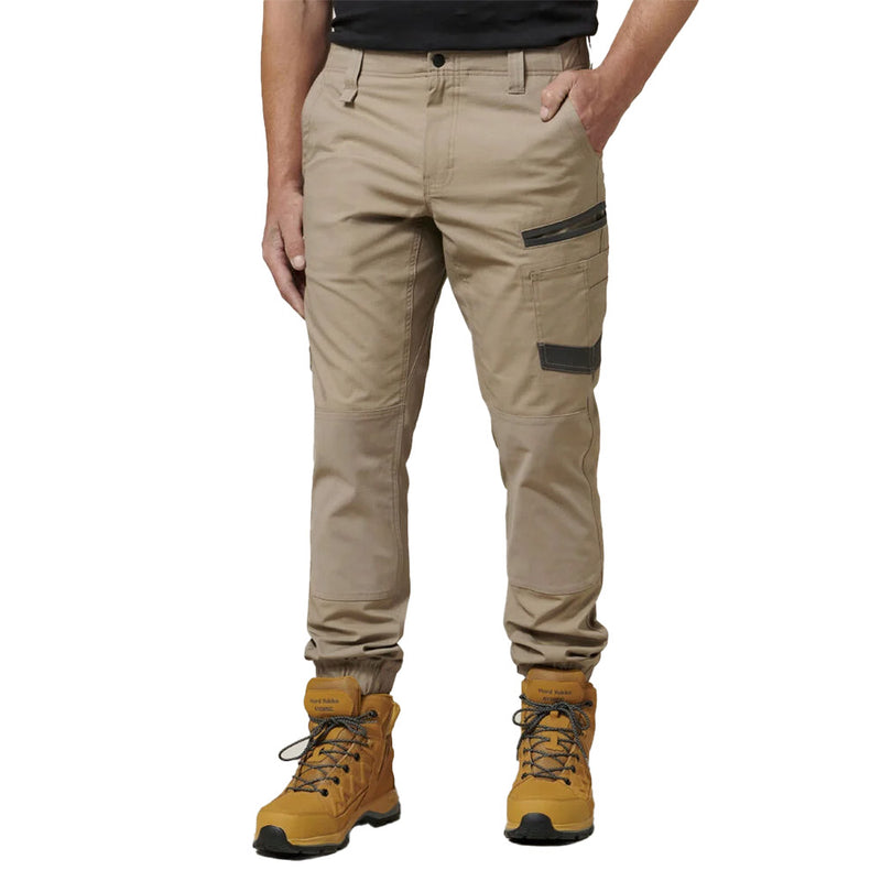 Load image into Gallery viewer, Hard Yakka 3056 Raptor Ripstop Cuffed Cargo Pant showcasing durable Ripstop fabric and reinforced abrasion zones, featuring a stretchy waistband, elastic ankle cuffs, and utility pockets, ideal for active work environments.